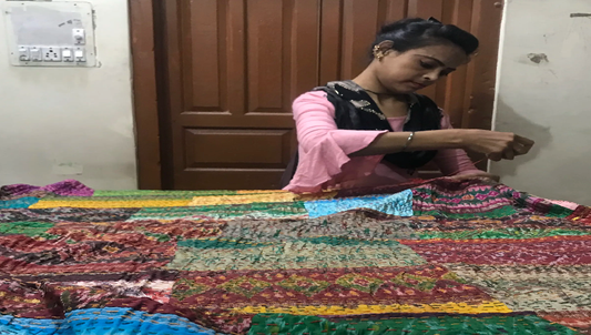 Woman Quilts Kantha Cloth