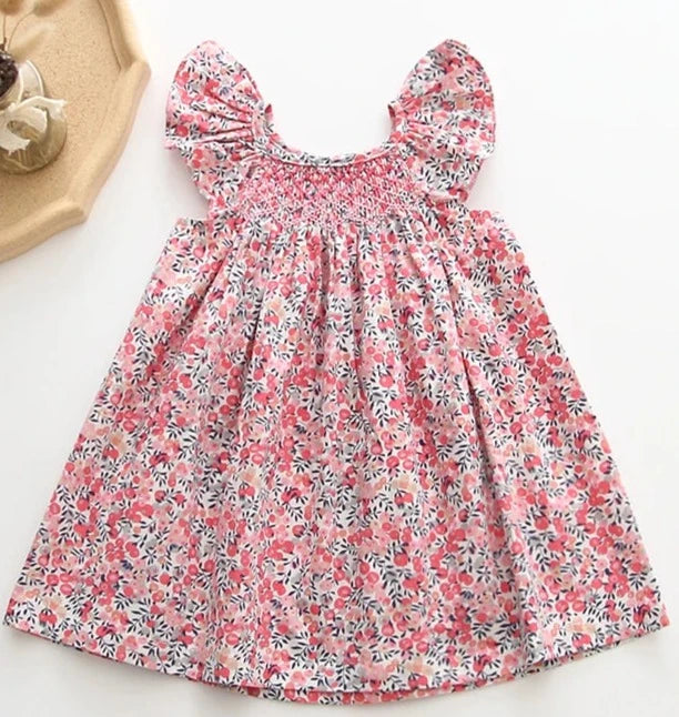 Smocked Dresses in European style, Flare Sleeves, Botanical mini prints. Sizes 6mo. to 4T. Perfect Summer go-to clothing!