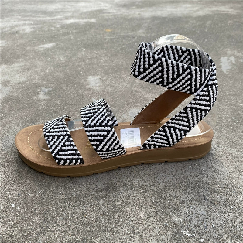 High Style in a Low Heel, Open Toe, Soft Rubber Sole, Comfortable, Elastic Strap Sandals in two perfect colors, Black & White and