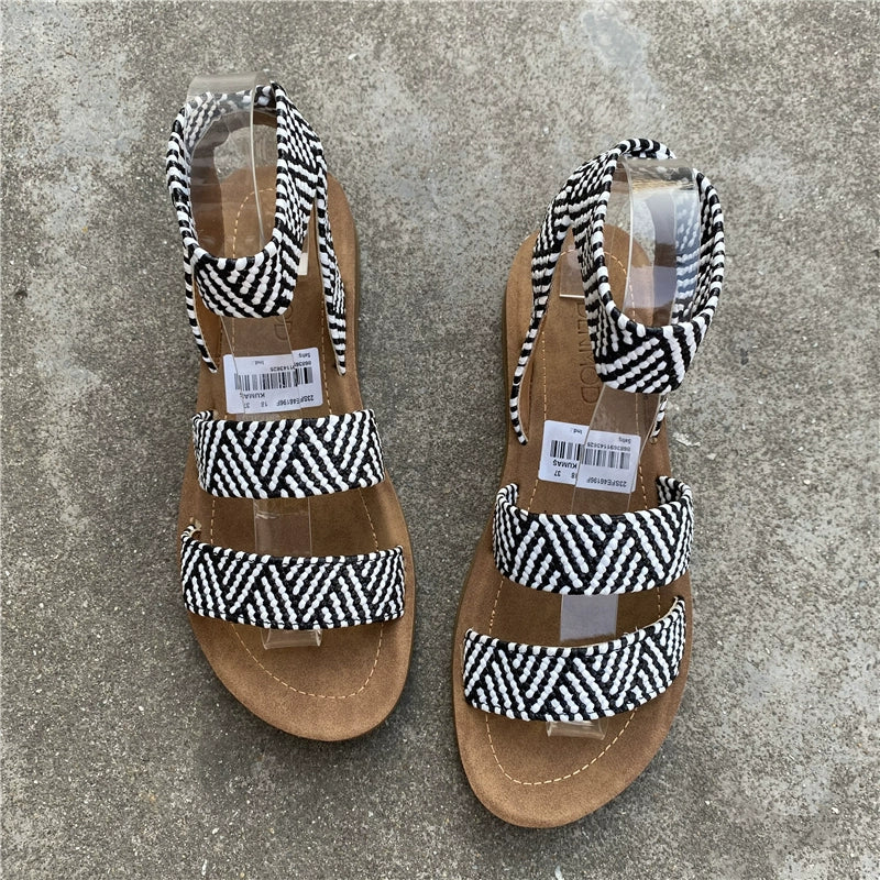 High Style in a Low Heel, Open Toe, Soft Rubber Sole, Comfortable, Elastic Strap Sandals in two perfect colors, Black & White and