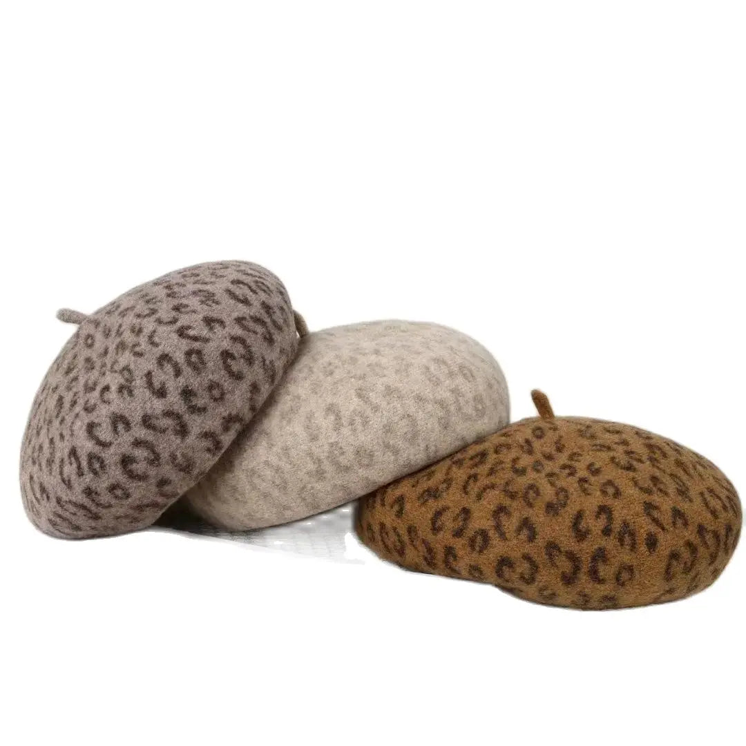 New Fun, Warm, and Elegant Leopard Print Berets in 4 colors. Top quality fashion design. 10" across at crown.