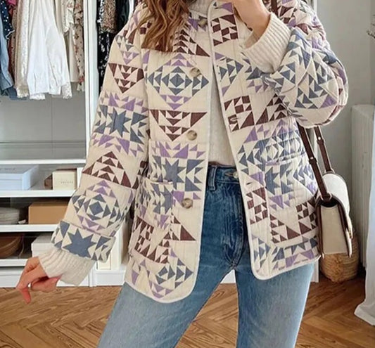Cozy 2-3 Season Soft Jacket in Quilt Patterns Print done in soft colors. Button closure and pockets!