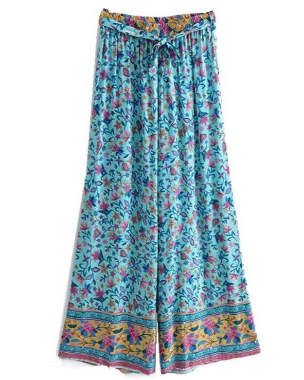 Two Piece Set - Bohemian Crop Top with Smocking & Spaghetti straps in Floral Print.  Wide Leg Pants Ruched at Waistband in Matching Fabric as Top.