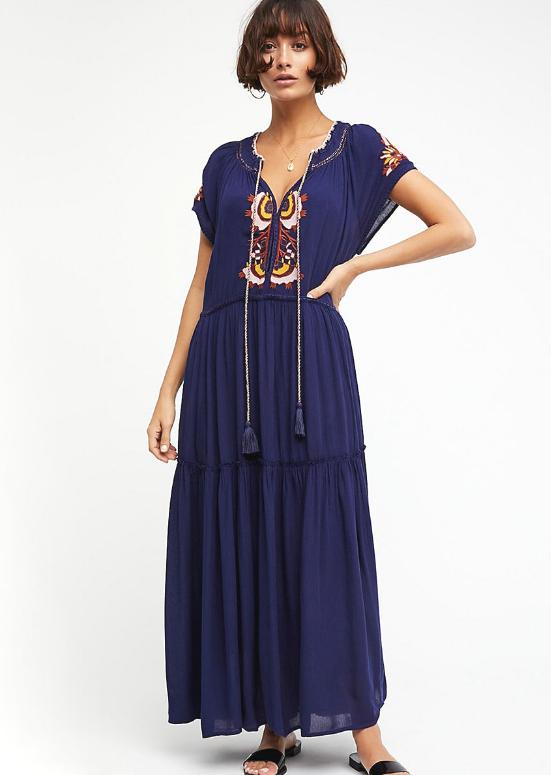 Great looking Maxi Dress with Lace Up Tassel neckline and Elegant Embroidery. Comes in Paprika, Indigo and Snow!