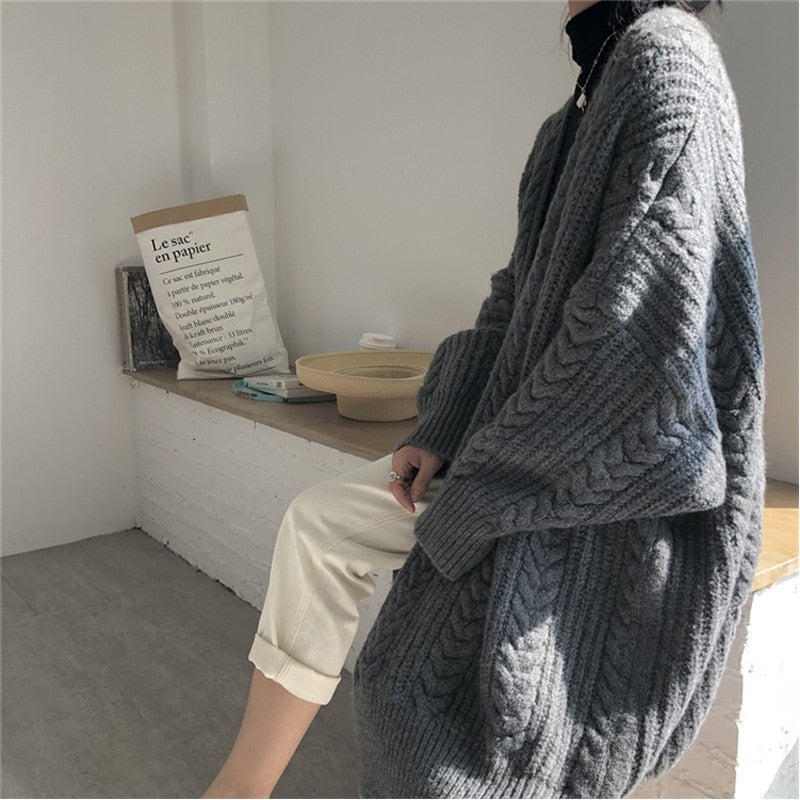 Twist Cable Knitted Sweater Coat. Thick and Long, meant to be worn loose.