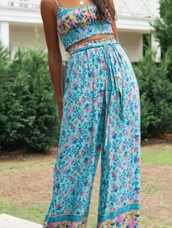 Two Piece Set - Bohemian Crop Top with Smocking & Spaghetti straps in Floral Print.  Wide Leg Pants Ruched at Waistband in Matching Fabric as Top.