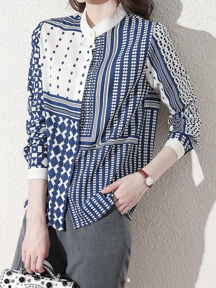 Patchwork Design in Blue on Ivory Printed on Chiffon. Casual Elegant Long Sleeve Euro-Top. Collarless with a Button on Collar and Sleeve Cuffs.