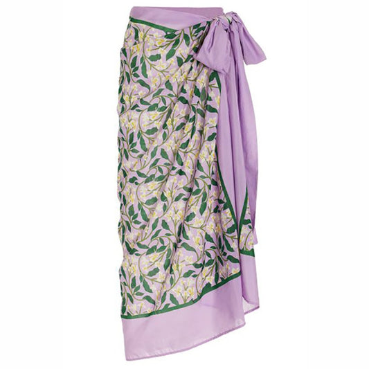 Purple background, overlay of White Honeysuckle Vines Print on One Piece Bathing Suit. Matching Wrap Skirt Cover-up available seperatly.