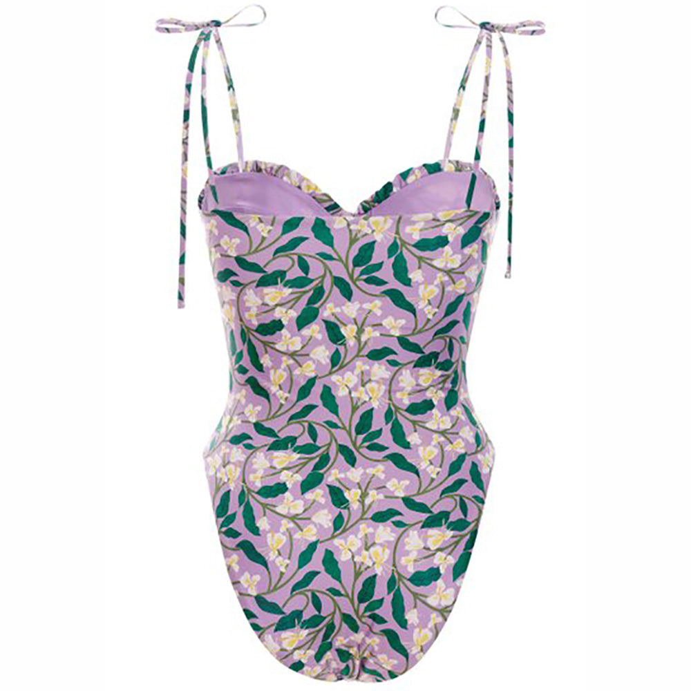 Purple background, overlay of White Honeysuckle Vines Print on One Piece Bathing Suit. Matching Wrap Skirt Cover-up available seperatly.