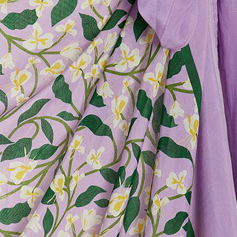 Purple background, overlay of White Honeysuckle Vines Print on One Piece Bathing Suit. Matching Wrap Skirt Cover-up available seperatly.